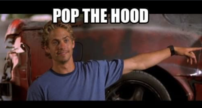 Meme of Paul Walker leaning on a car, pointing at it with the caption "pop the hood"